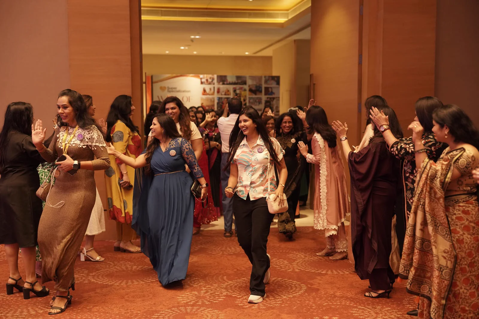 Women entering the grand hall