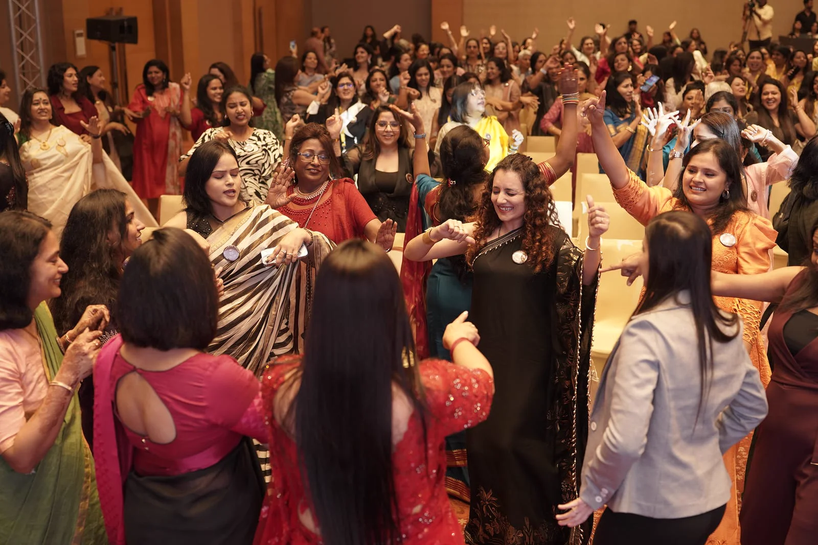 Women dancing in the grand hall
